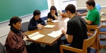 Students sitting around long table