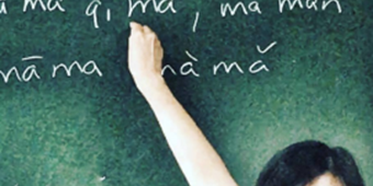 Hand writing on chalkboard